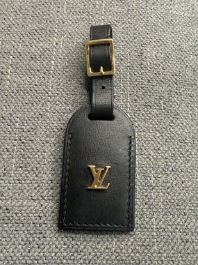 Louis Vuitton LV plate leather charm name tag